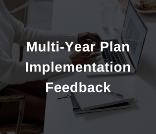 Multi-Year Implementation plan Feedback with person working on laptop