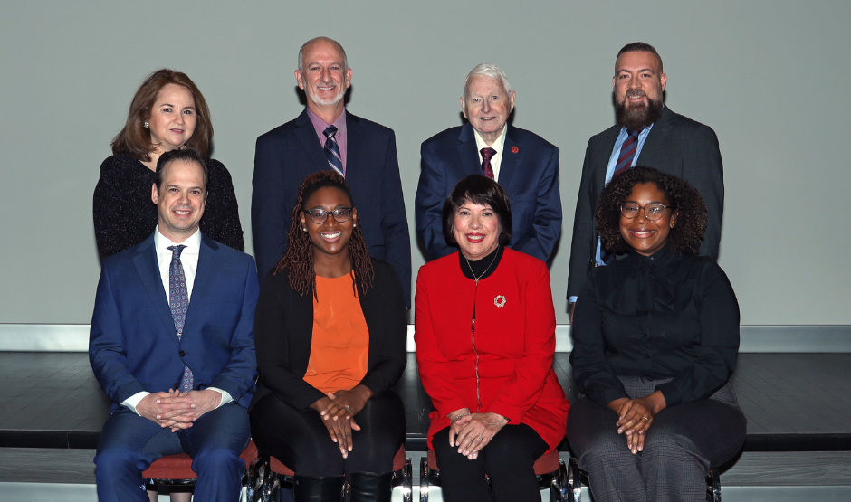 The board of trustees sitting together