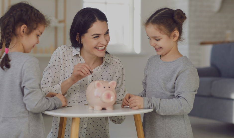 Adult a child and a piggy bank