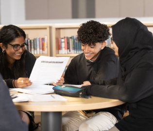 Students working together in a library