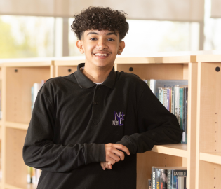 Male student in a library