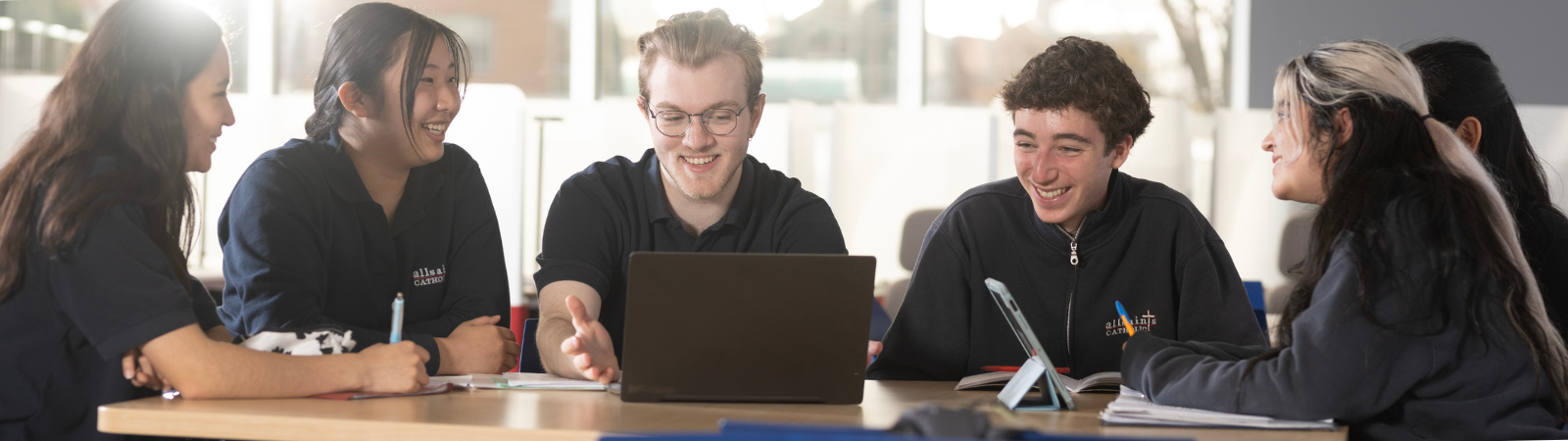 Students at a table in the library